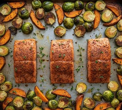 1. Cajun Salmon with Crispy Brussels and Sweet Potato Wedges