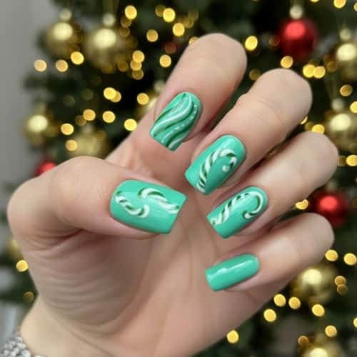 9. Green Candy Cane Swirl Nails